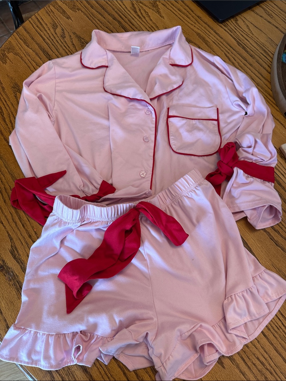 Women's Pink Two-Piece Ruffle Pajama Set with Red Trim